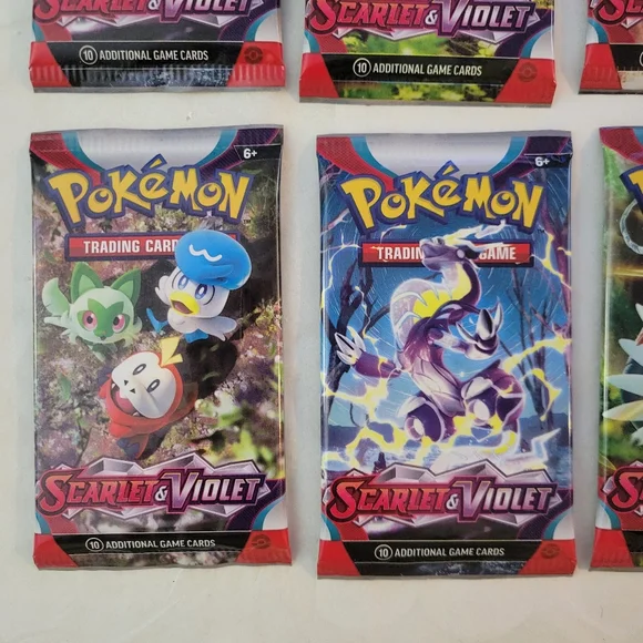 11 Packs Pokemon Scarlet and Violet Cards Factory Sealed Plus 2 Keychains - Picture 4 of 8